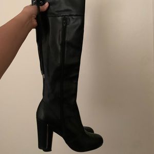Thigh high black boots